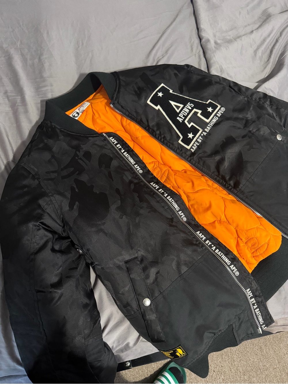 Black Bomber Jacket with Orange Lining